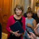 Senator Lisa Murkowski, an Alaska Republican, passes reporters as she leaves the Senate chamber after voting ‘no’ on a a measure to repeal parts of former US president Barack Obama’s health care law.